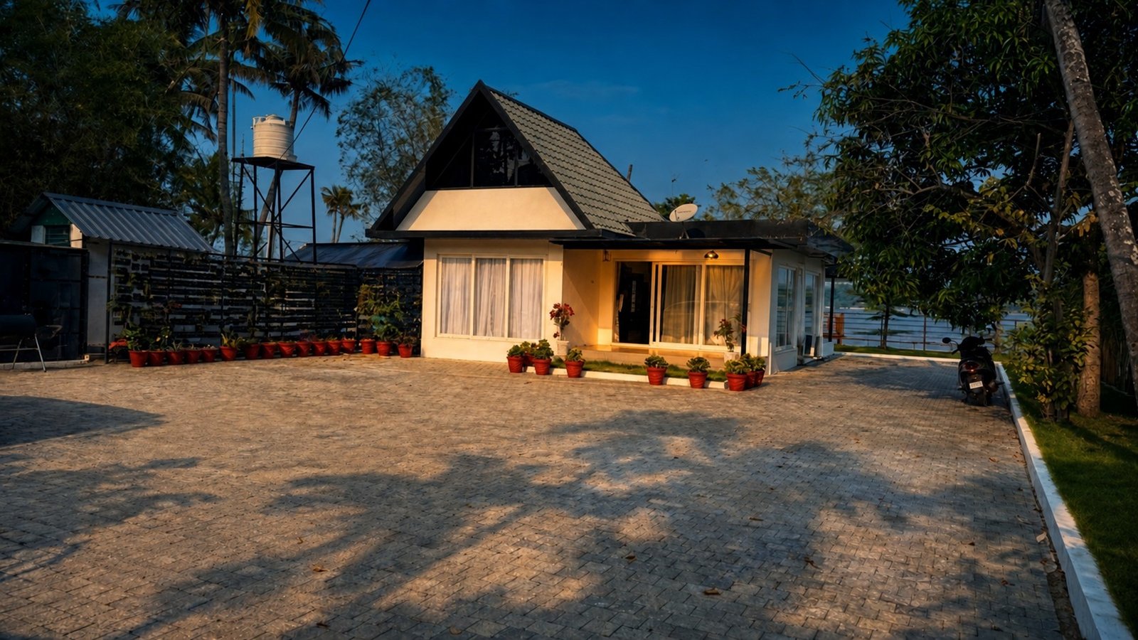 Mayooram villa entrance framed by palms